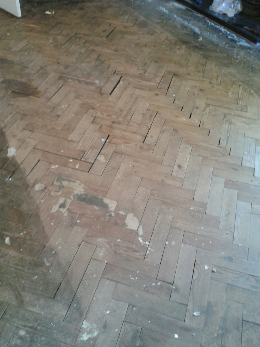 Pitch pine parquet floor repaired after a flood